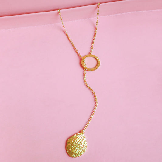 Statement Gold Toned Long Necklace with a textured Pendant