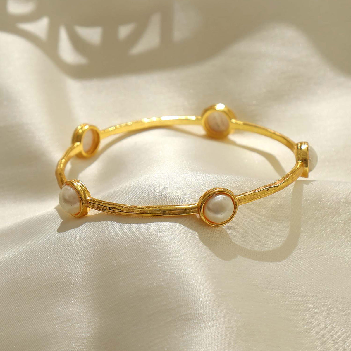 Gold Round Pearl Interval Bangle