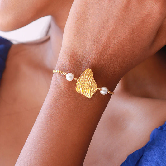 Statement Gold Toned Textured Bracelet with Pearls