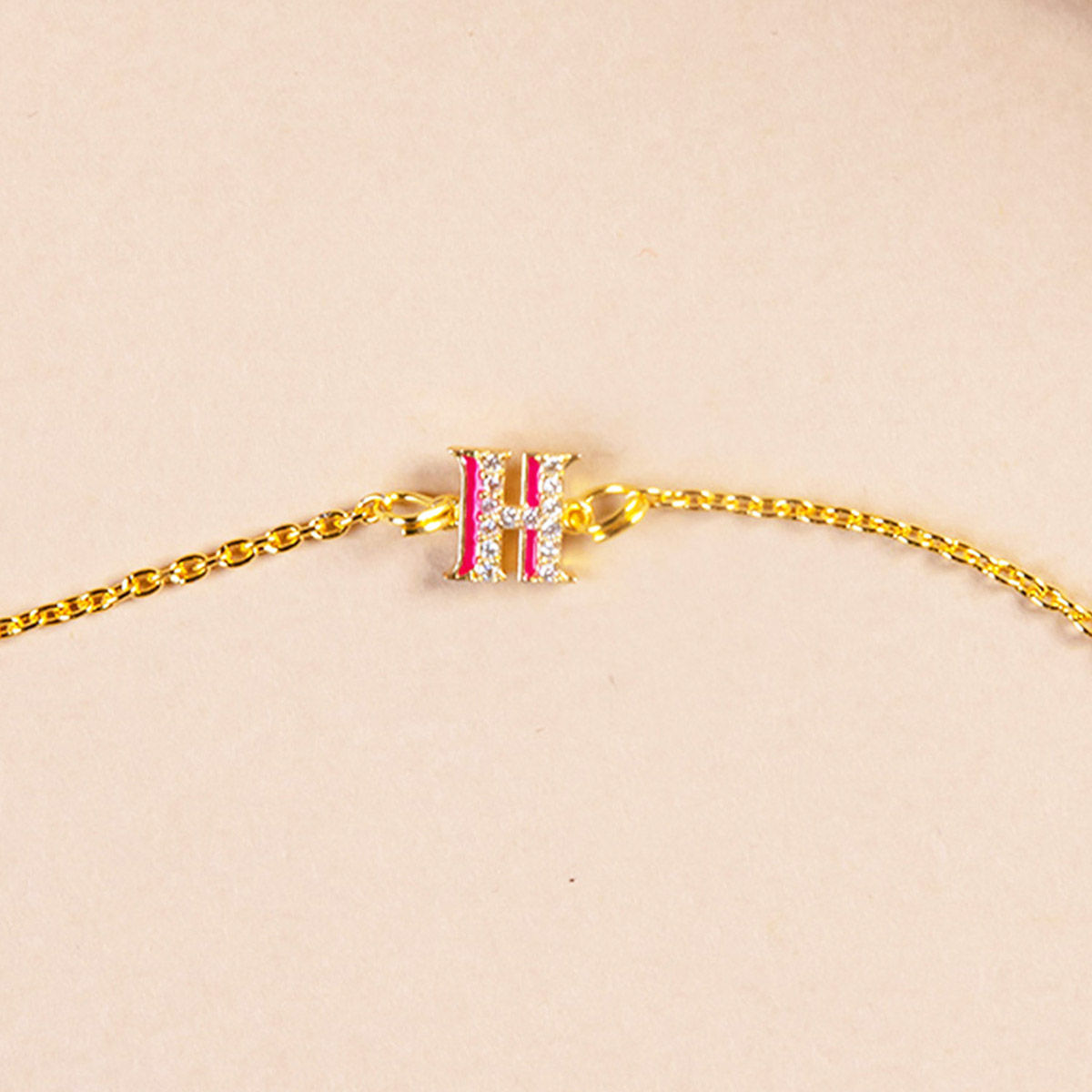 Pink CZ Studded H Initial Bracelet